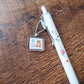 meriBun Uni-ball One Gel Pen with Charm, Postal Theme, 2 designs