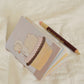 Square Studio x Pige Artist Collab Passport-Sized Notebook of Mix Paper and Illustration, 2 Designs