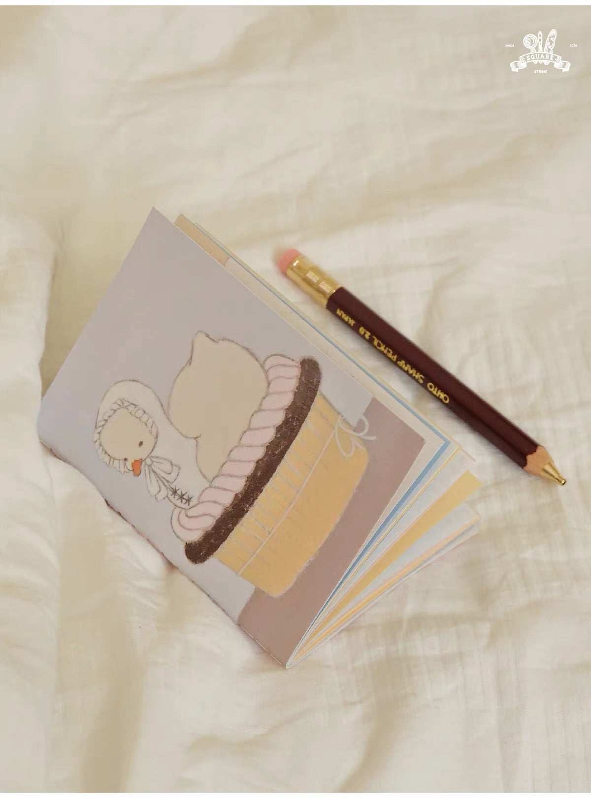 Square Studio x Pige Artist Collab Passport-Sized Notebook of Mix Paper and Illustration, 2 Designs