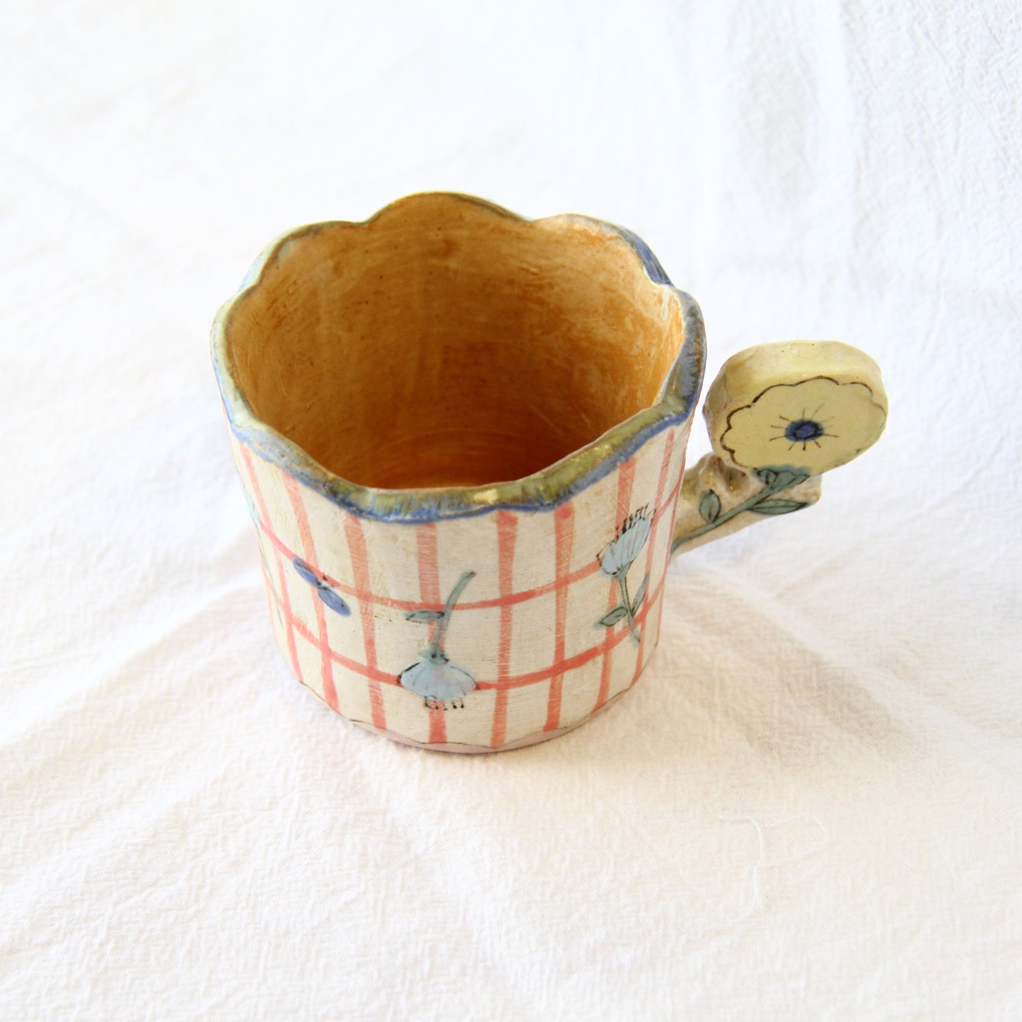 the cozy nook Mug with Flower Handle