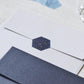 a piece of the dark tone washi seal in actual use on an white envelope